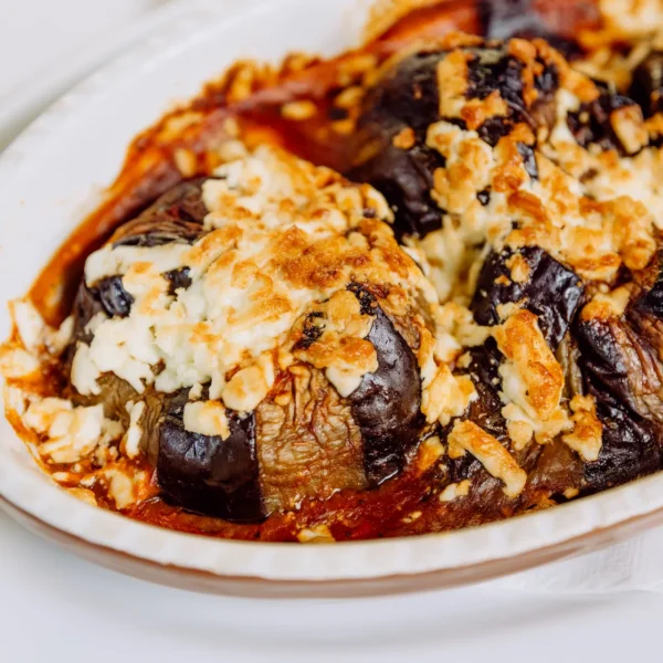 Galerie Frische Auberginen in Tomatensauce und Feta überbacken im Restaurant Ilion Hannover